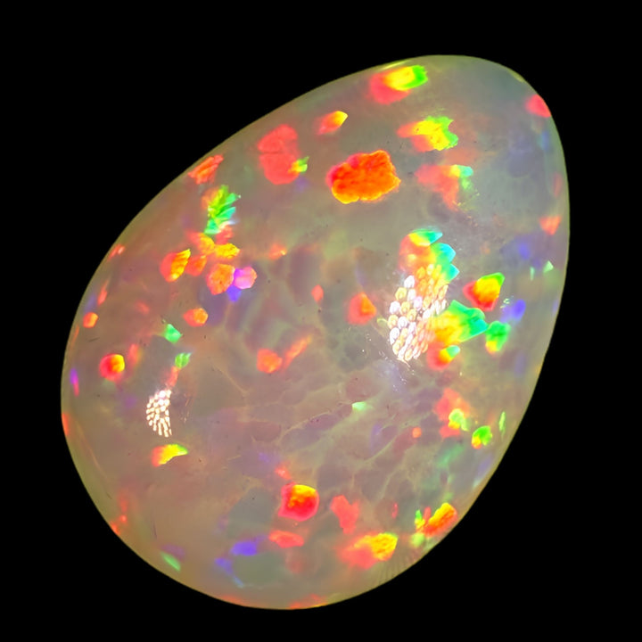8.5ct AAA quality Natural Ethiopian Welo Opal – Pear Cabochon – Fiery Red, Neon Green & Sunset Orange Fire – Honeycomb Floral Pattern – AAA Collector Grade