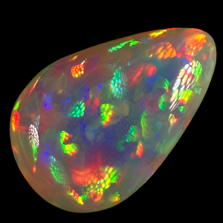 9.88ct AAA quality Natural Ethiopian Welo Opal – Pear Cabochon – Neon Green, Fiery Red & Electric Rainbow Fire – Floral Honeycomb Pattern – AAA Collector Grade