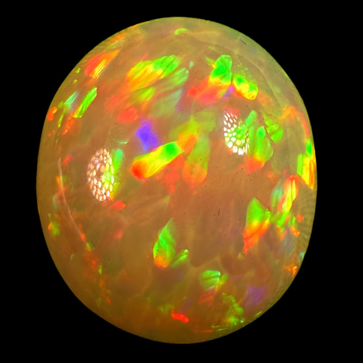 11.17ct AAA quality Natural Ethiopian Welo Opal – Oval Cabochon – Neon Green, Fiery Orange & Electric Red Fire – Broadflash Honeycomb Pattern – AAA Collector Grade