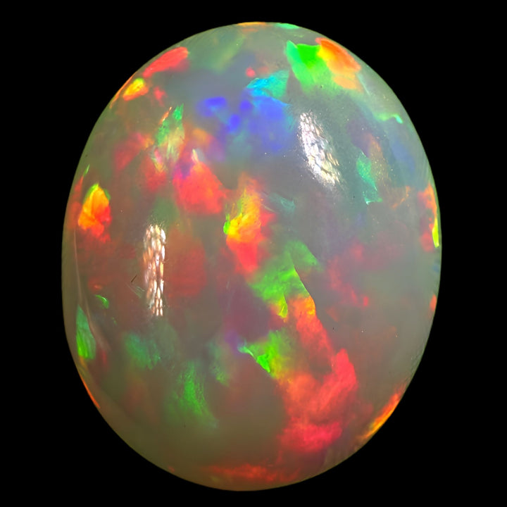 7.57ct AAA quality Natural Ethiopian Welo Opal – Oval Cabochon – Fiery Red, Neon Green & Electric Blue Fire – Rolling Broadflash Pattern – AAA Collector Grade