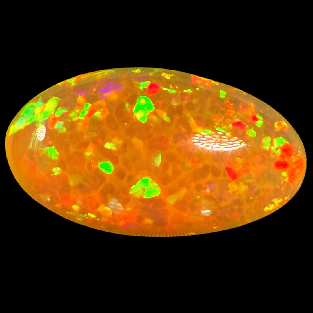 12.31ct AAA quality Natural Ethiopian Welo Opal – Oval Cabochon – Neon Green, Fiery Orange & Cherry Red Fire – Honeycomb Confetti Pattern – AAA Collector Grade
