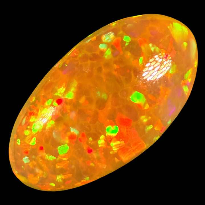12.31ct AAA quality Natural Ethiopian Welo Opal – Oval Cabochon – Neon Green, Fiery Orange & Cherry Red Fire – Honeycomb Confetti Pattern – AAA Collector Grade