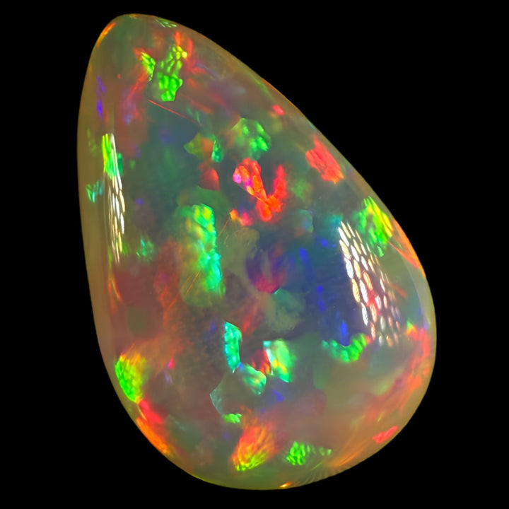9.88ct AAA quality Natural Ethiopian Welo Opal – Pear Cabochon – Neon Green, Fiery Red & Electric Rainbow Fire – Floral Honeycomb Pattern – AAA Collector Grade
