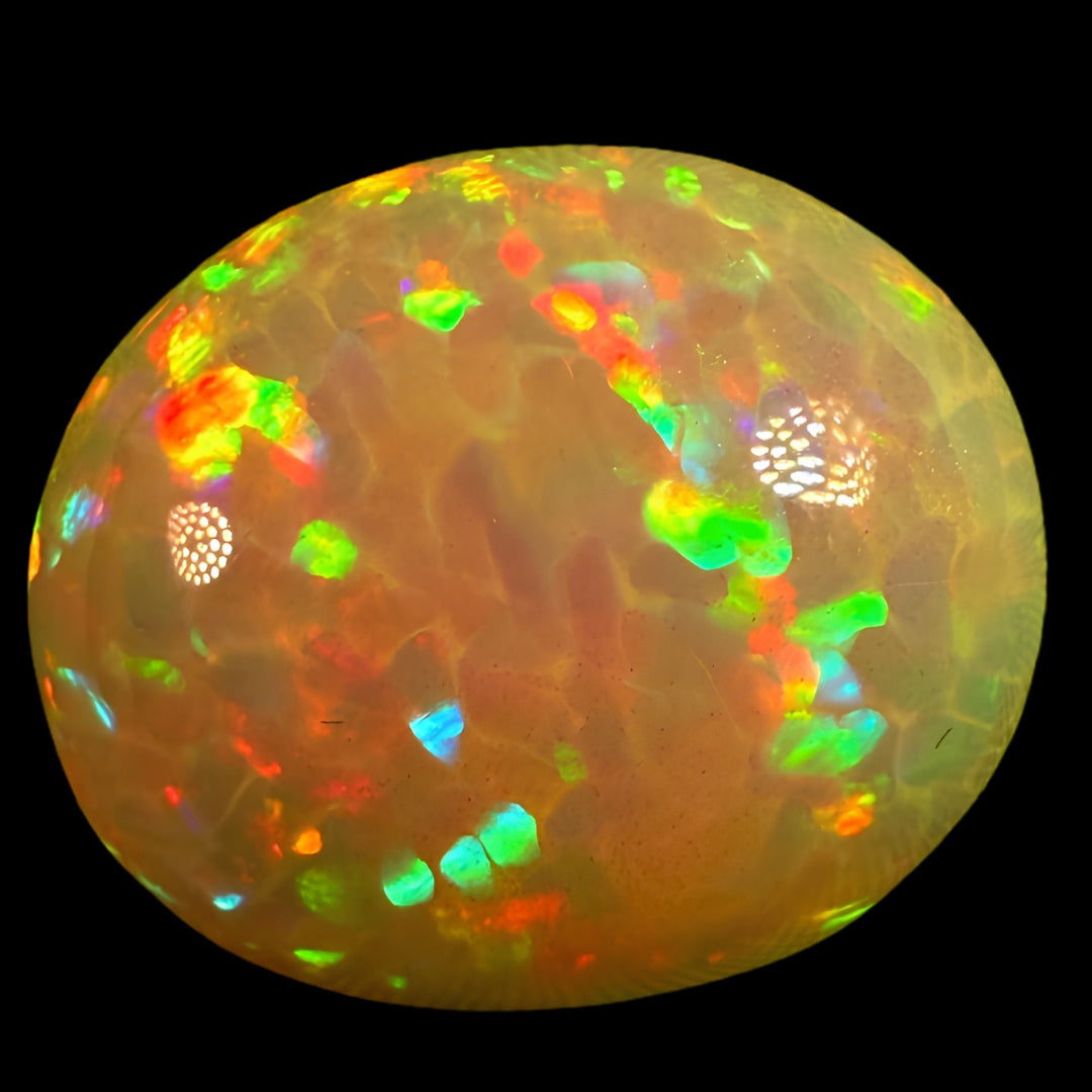 11.17ct AAA quality Natural Ethiopian Welo Opal – Oval Cabochon – Neon Green, Fiery Orange & Electric Red Fire – Broadflash Honeycomb Pattern – AAA Collector Grade