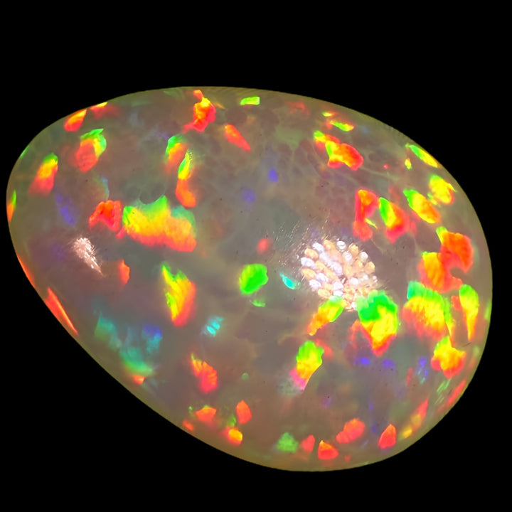 8.5ct AAA quality Natural Ethiopian Welo Opal – Pear Cabochon – Fiery Red, Neon Green & Sunset Orange Fire – Honeycomb Floral Pattern – AAA Collector Grade