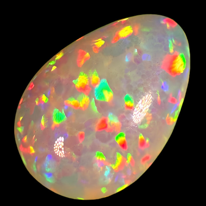 8.5ct AAA quality Natural Ethiopian Welo Opal – Pear Cabochon – Fiery Red, Neon Green & Sunset Orange Fire – Honeycomb Floral Pattern – AAA Collector Grade