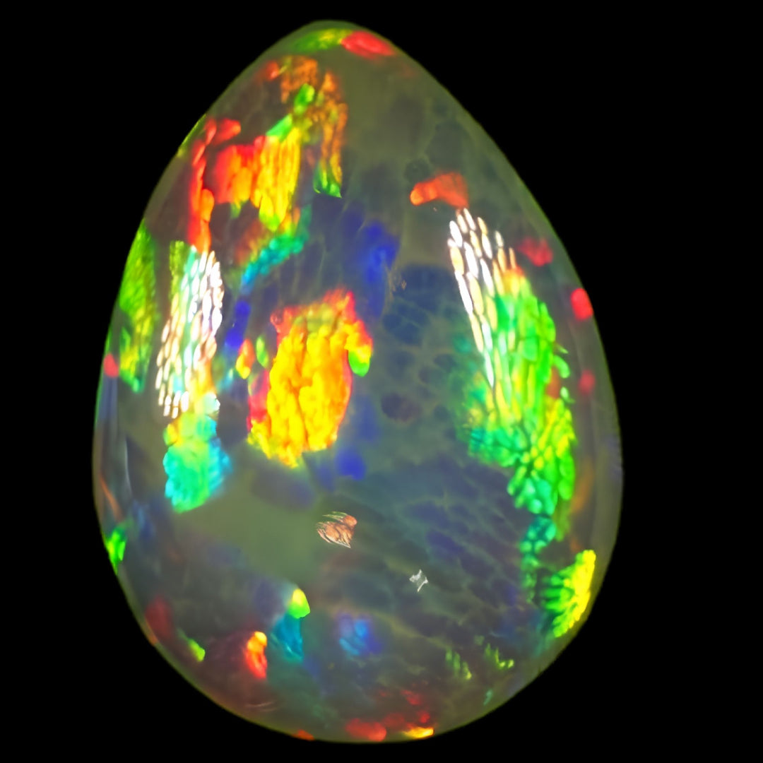 8.39ct AAA quality Natural Ethiopian Welo Opal – Pear Cabochon – Neon Green, Fiery Red & Electric Blue Fire – Broadflash Honeycomb Pattern – AAA Collector Grade