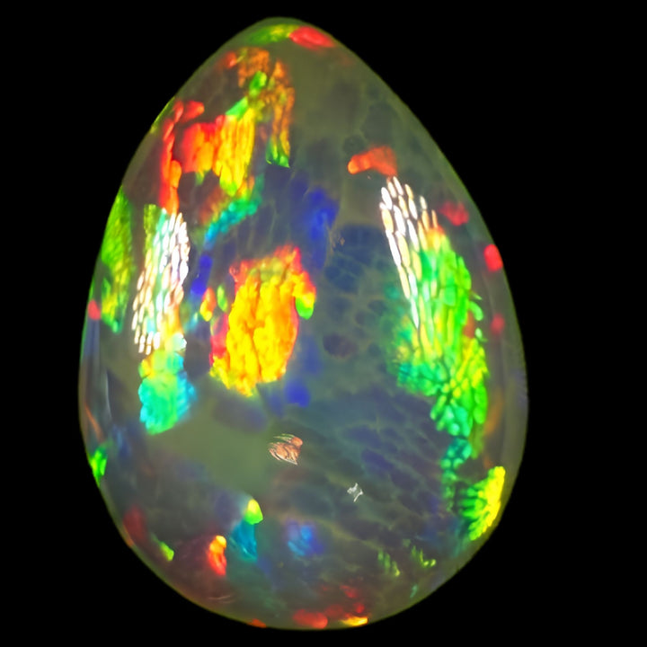 8.39ct AAA quality Natural Ethiopian Welo Opal – Pear Cabochon – Neon Green, Fiery Red & Electric Blue Fire – Broadflash Honeycomb Pattern – AAA Collector Grade