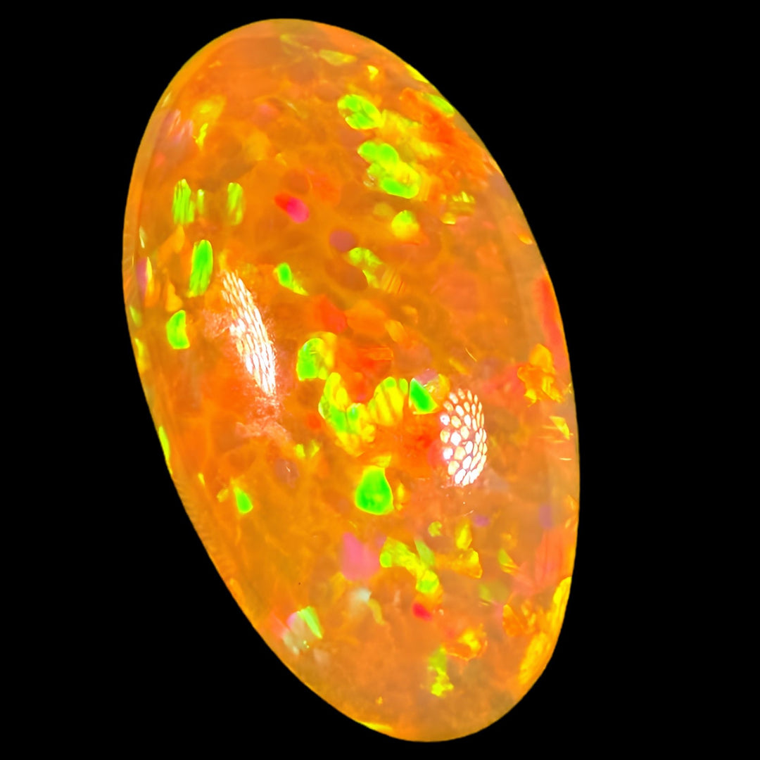 12.31ct AAA quality Natural Ethiopian Welo Opal – Oval Cabochon – Neon Green, Fiery Orange & Cherry Red Fire – Honeycomb Confetti Pattern – AAA Collector Grade