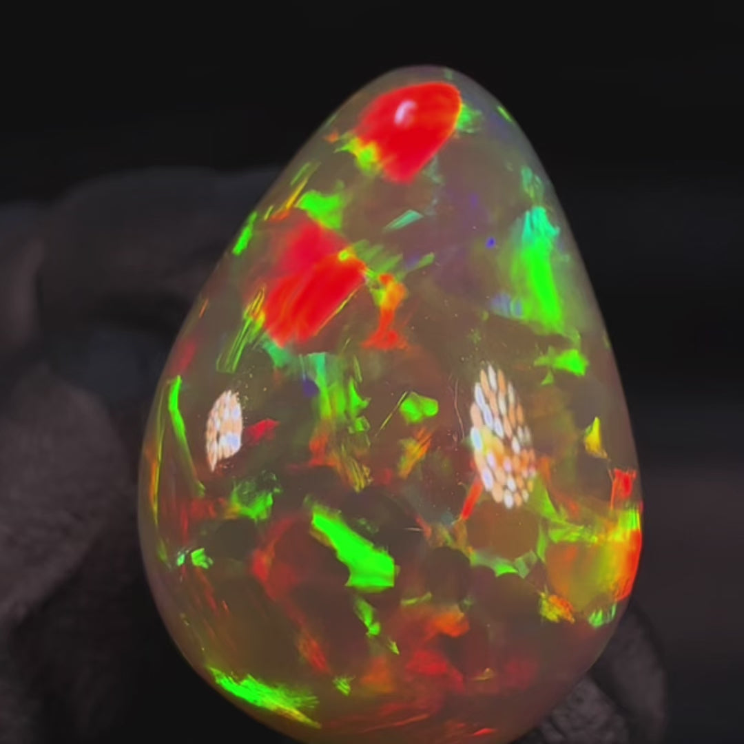 14.32ct AAA quality Natural Ethiopian Welo Opal – Pear Cabochon – Fiery Red, Neon Green & Golden Orange Fire – Broadflash Floral Pattern – AAA Collector Grade