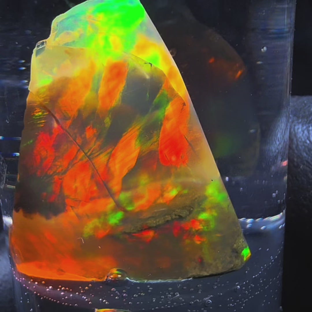 7.05 Gram Natural Ethiopian Welo Crystal Water Opal Specimen – Dominant Fiery Red Broadflash, Neon Green Crown Fire & Golden Honey Glow – Floating Crystal Display Opal – Collector Grade